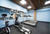 Basement Fitness Center treadmills, elliptical, and spin bike